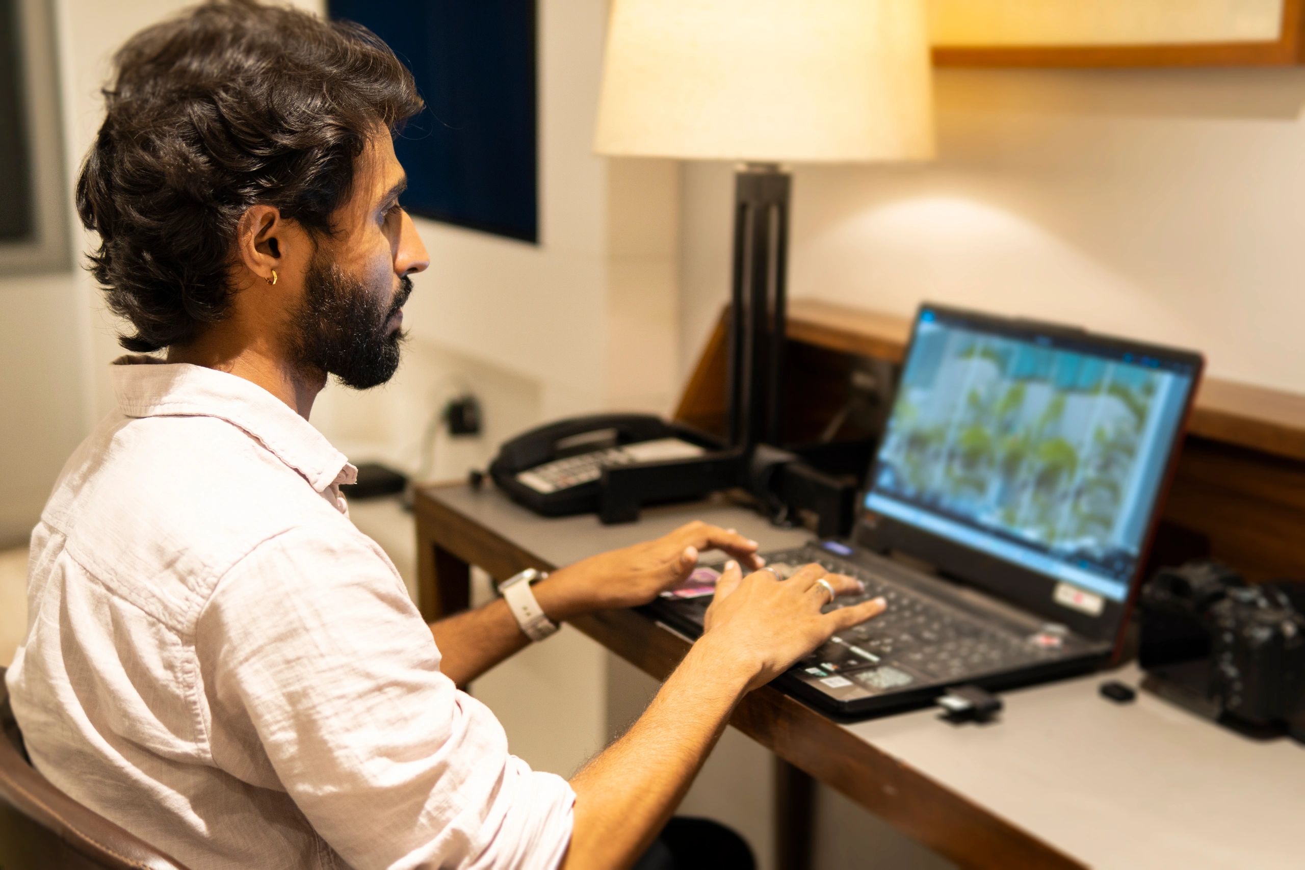 Editor reviewing news images and reporting material